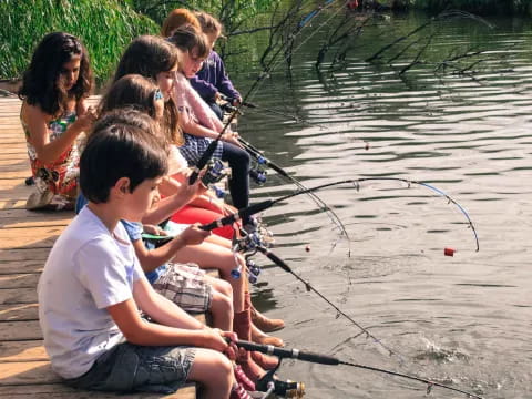 a group of people fishing