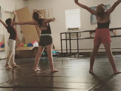 a group of women doing yoga