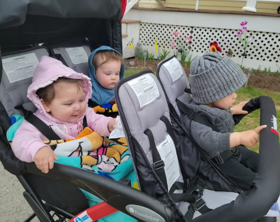 two children in a stroller