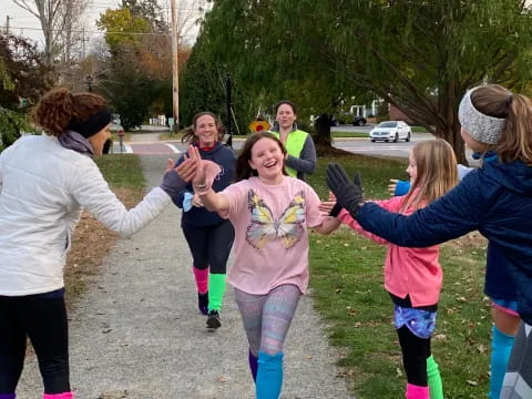 a group of people playing outside