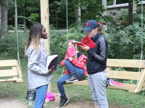 a group of people on a swing