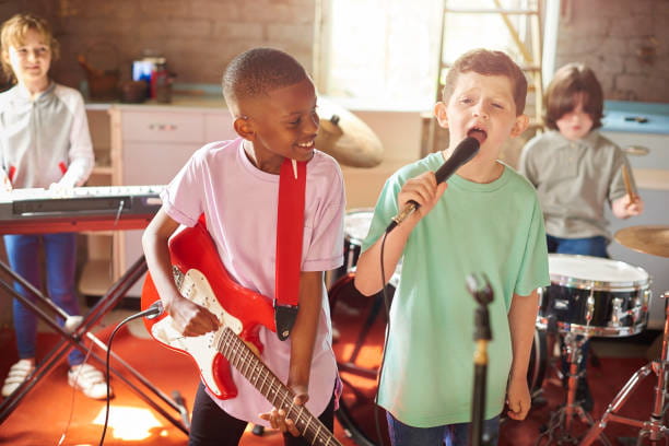 a group of kids playing instruments