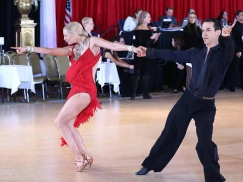 a man and woman dancing
