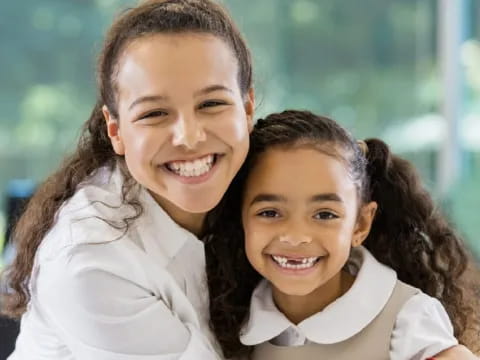 a person and a child smiling