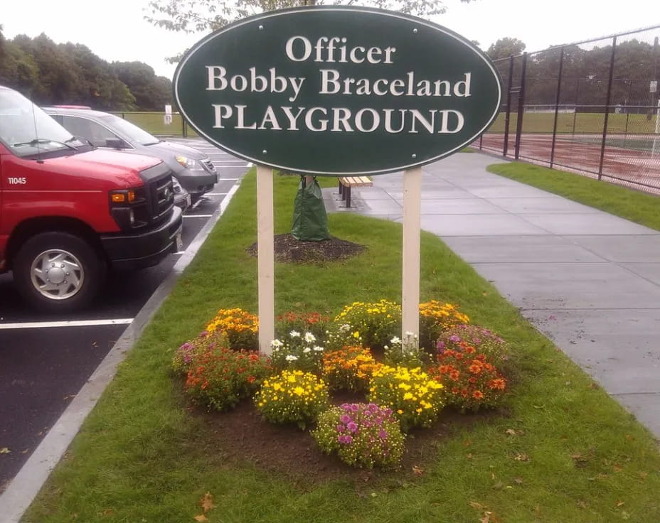 a sign on the side of a road