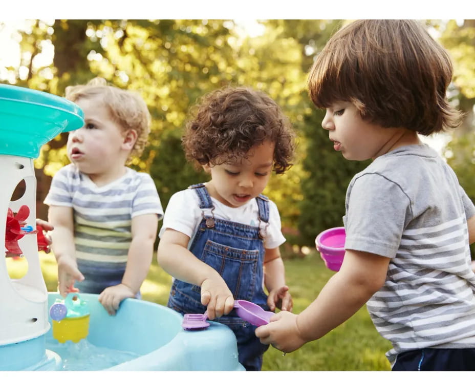 a group of kids playing with toys