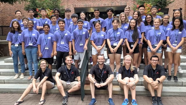a group of people posing for a photo