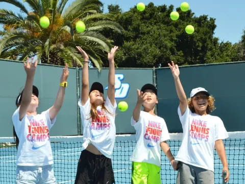 a group of women playing tennis