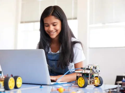 a woman working on a laptop