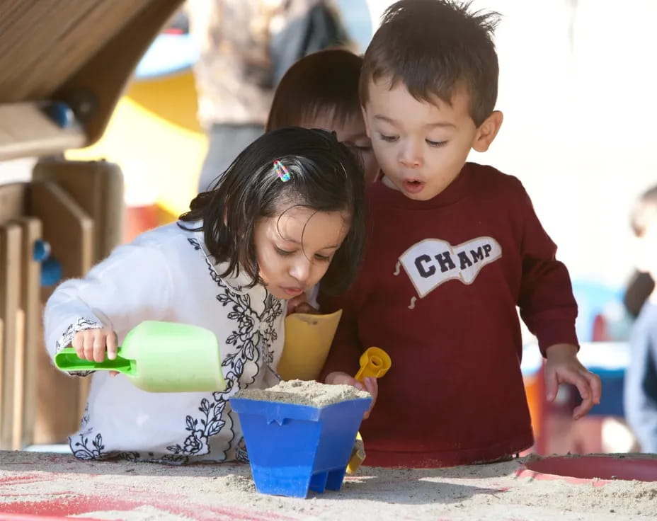 a few children playing with toys
