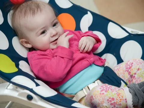 a baby in a car seat