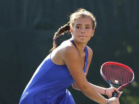 a woman playing tennis