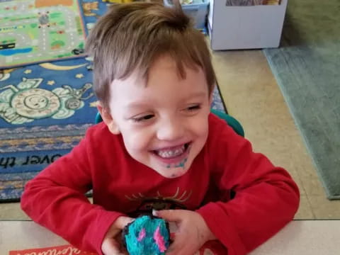a child playing with a toy