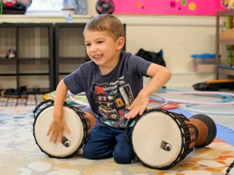 a boy playing drums