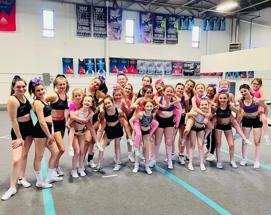 a group of women in a gym