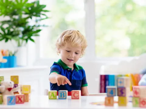 a child sitting at a table