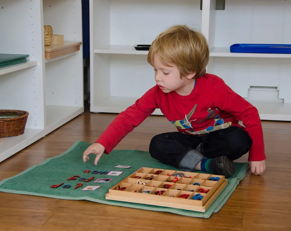 a child sitting on the floor