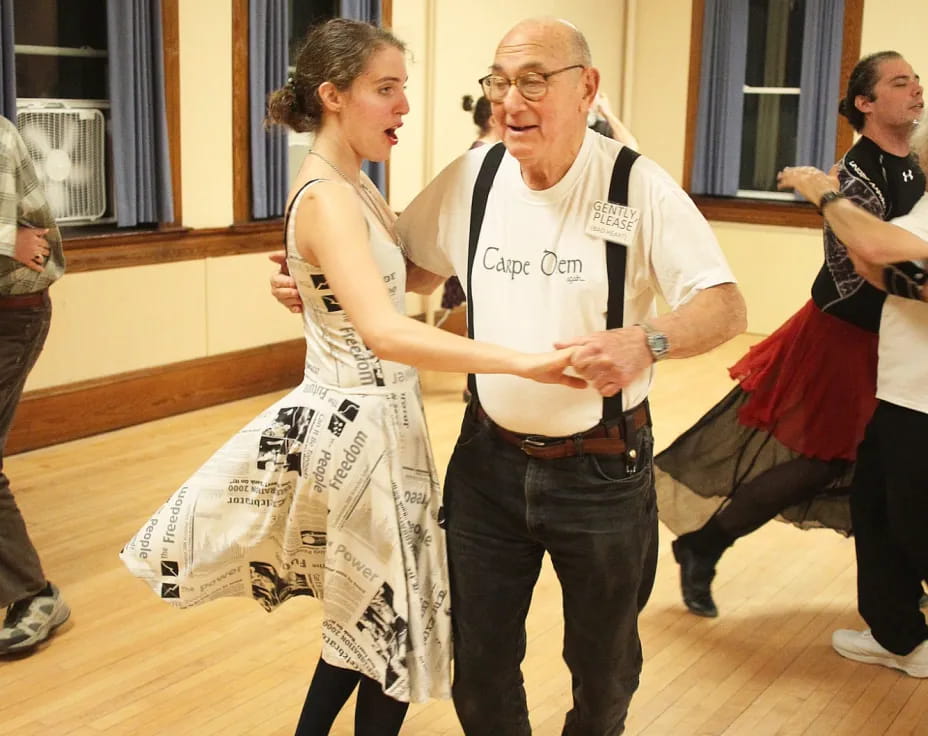 a man and woman dancing