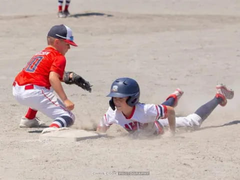 a couple of kids playing baseball