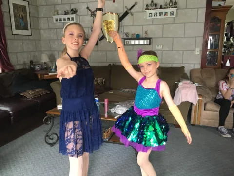 two girls wearing clothing
