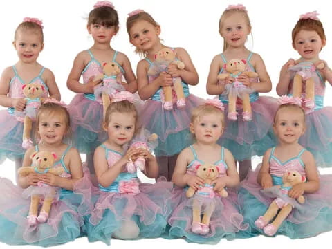 a group of children in dresses