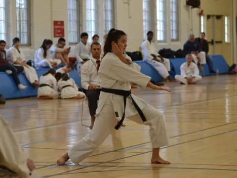 a person in a karate uniform