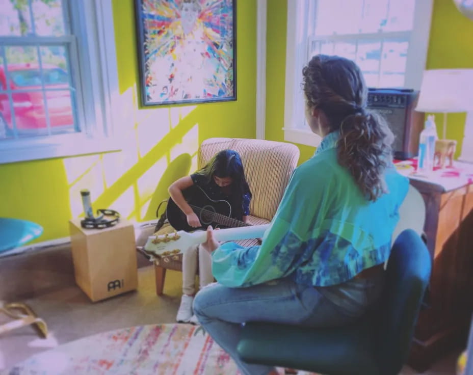 a group of people sitting in a room