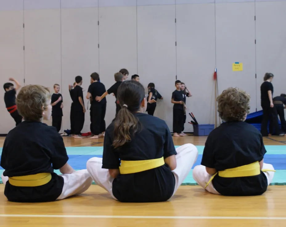 a group of people in a gym