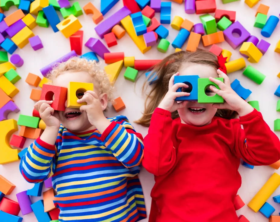 a couple of children wearing masks