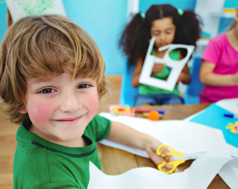 a young boy smiling