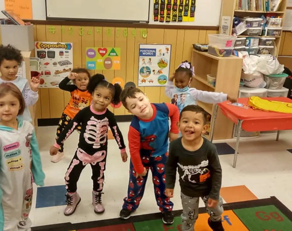a group of children in a classroom