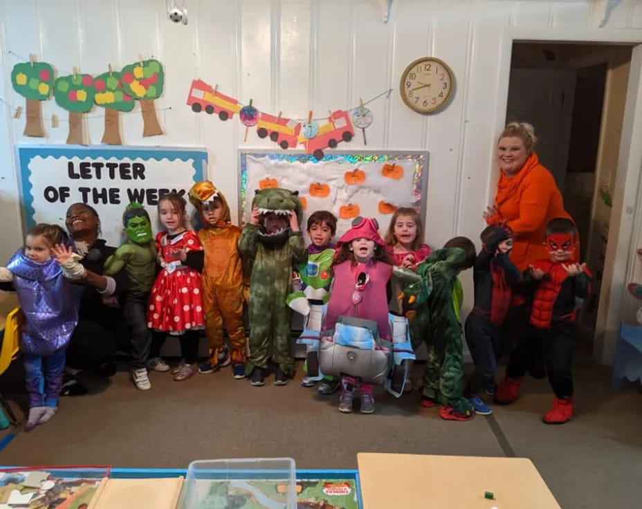 a group of children in clothing