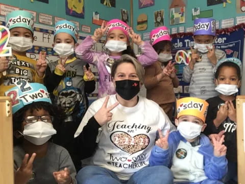 a group of kids wearing masks