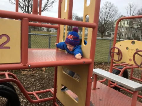 a child on a playground ride