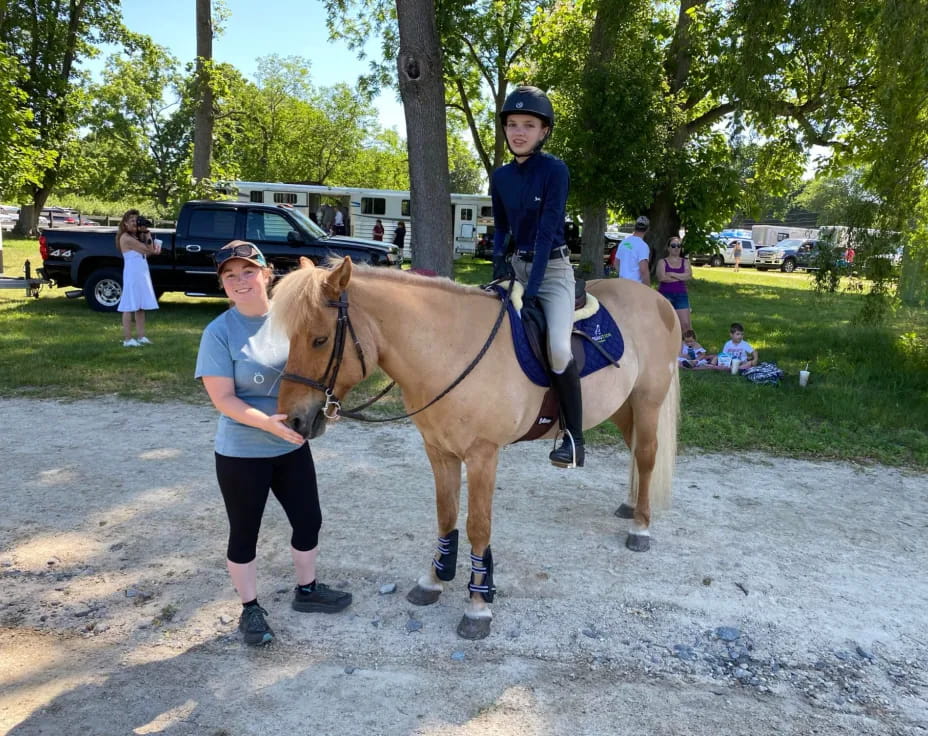 a person leading a horse