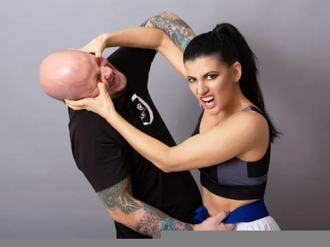 a woman holding a man