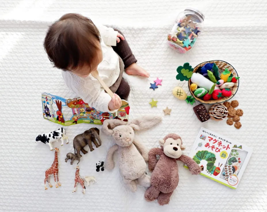 a baby playing with toys