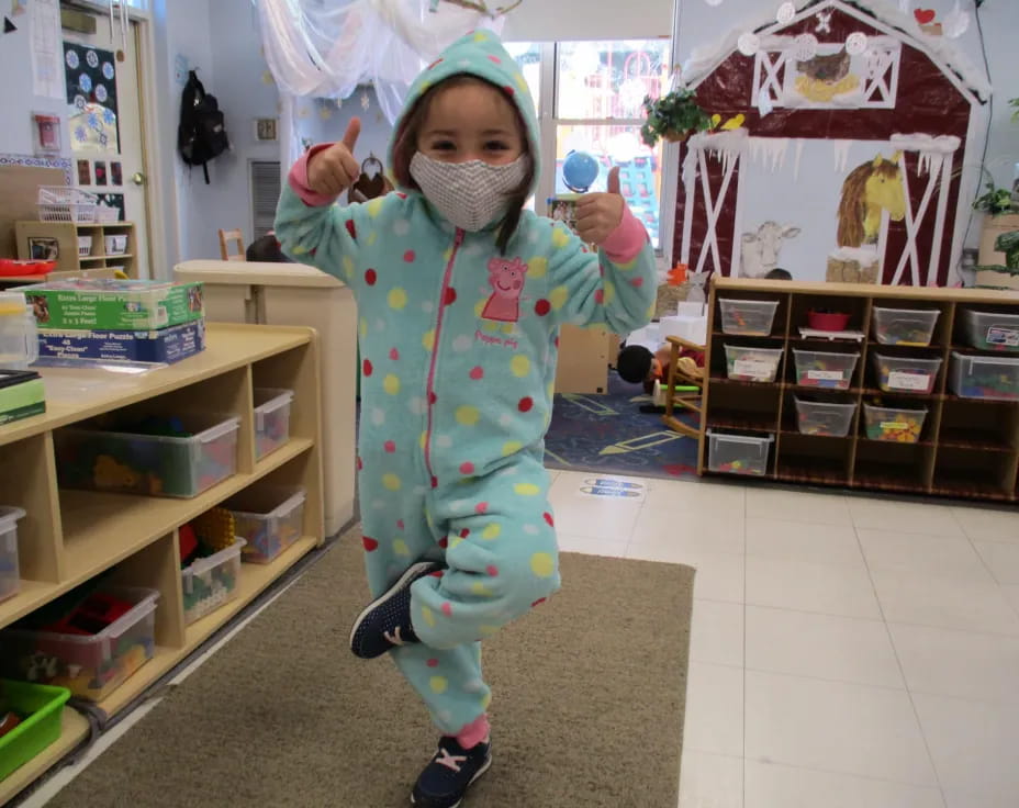 a child wearing a garment