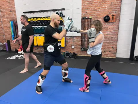 a group of people in a gym