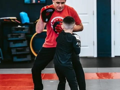 a person holding a child