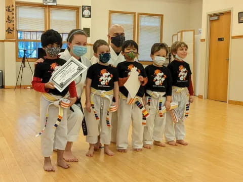 a group of kids wearing masks