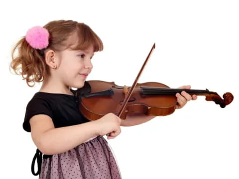 a girl playing a violin