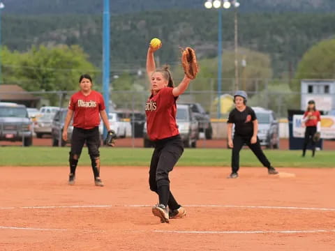 a person throwing a baseball