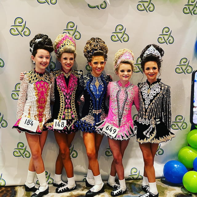 a group of girls wearing clothing