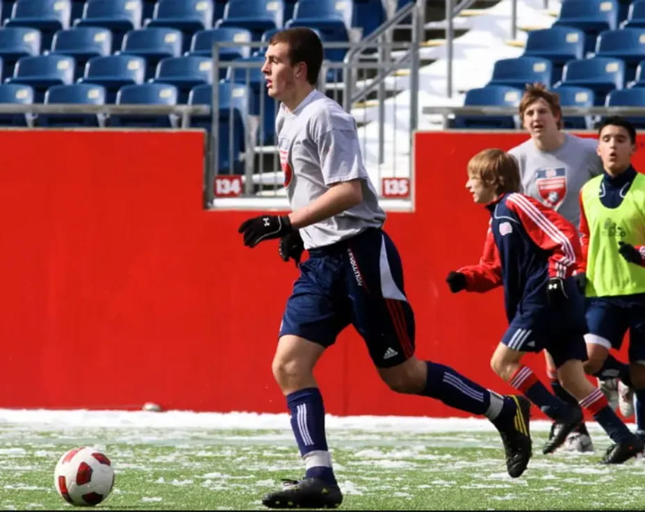 a group of men playing football