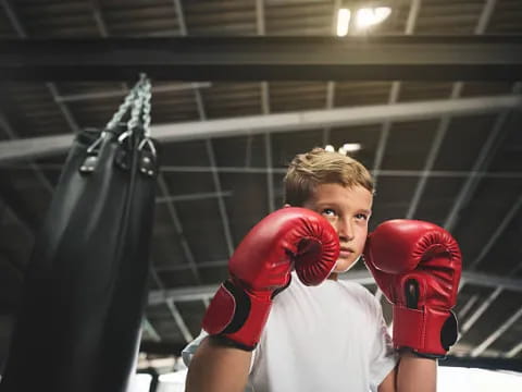 a person wearing boxing gloves