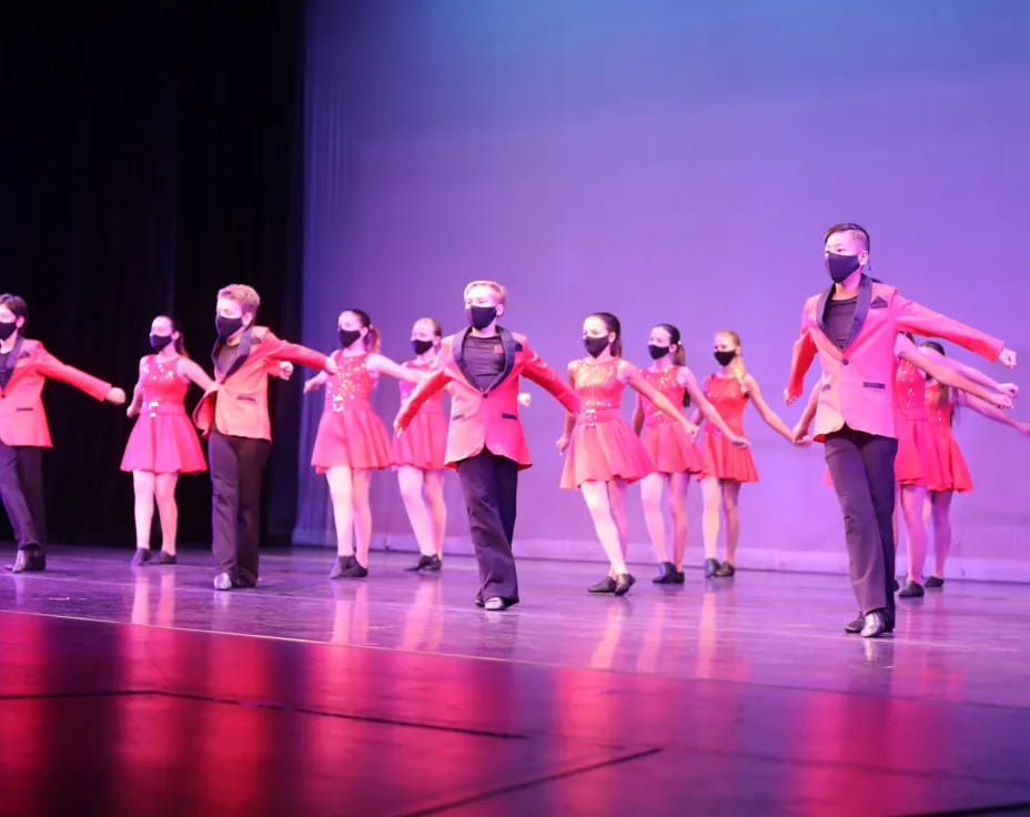 a group of people on a stage