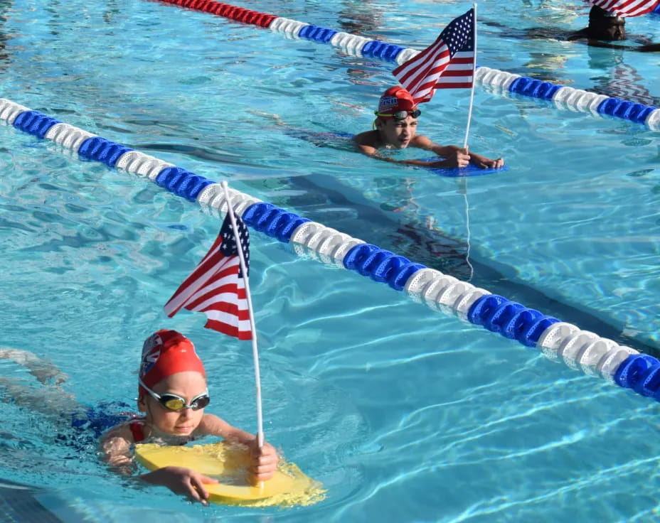 a group of people in a pool