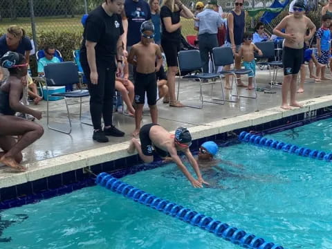 a group of people in a pool