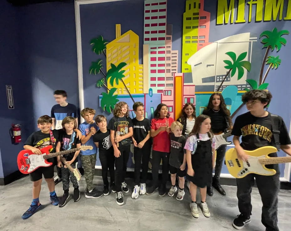 a group of kids posing for a photo